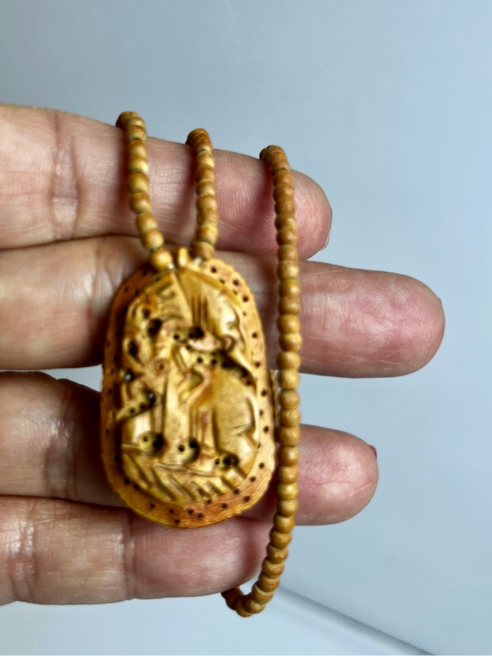 Hand-Carved Wooden Pendant Necklace from India $20